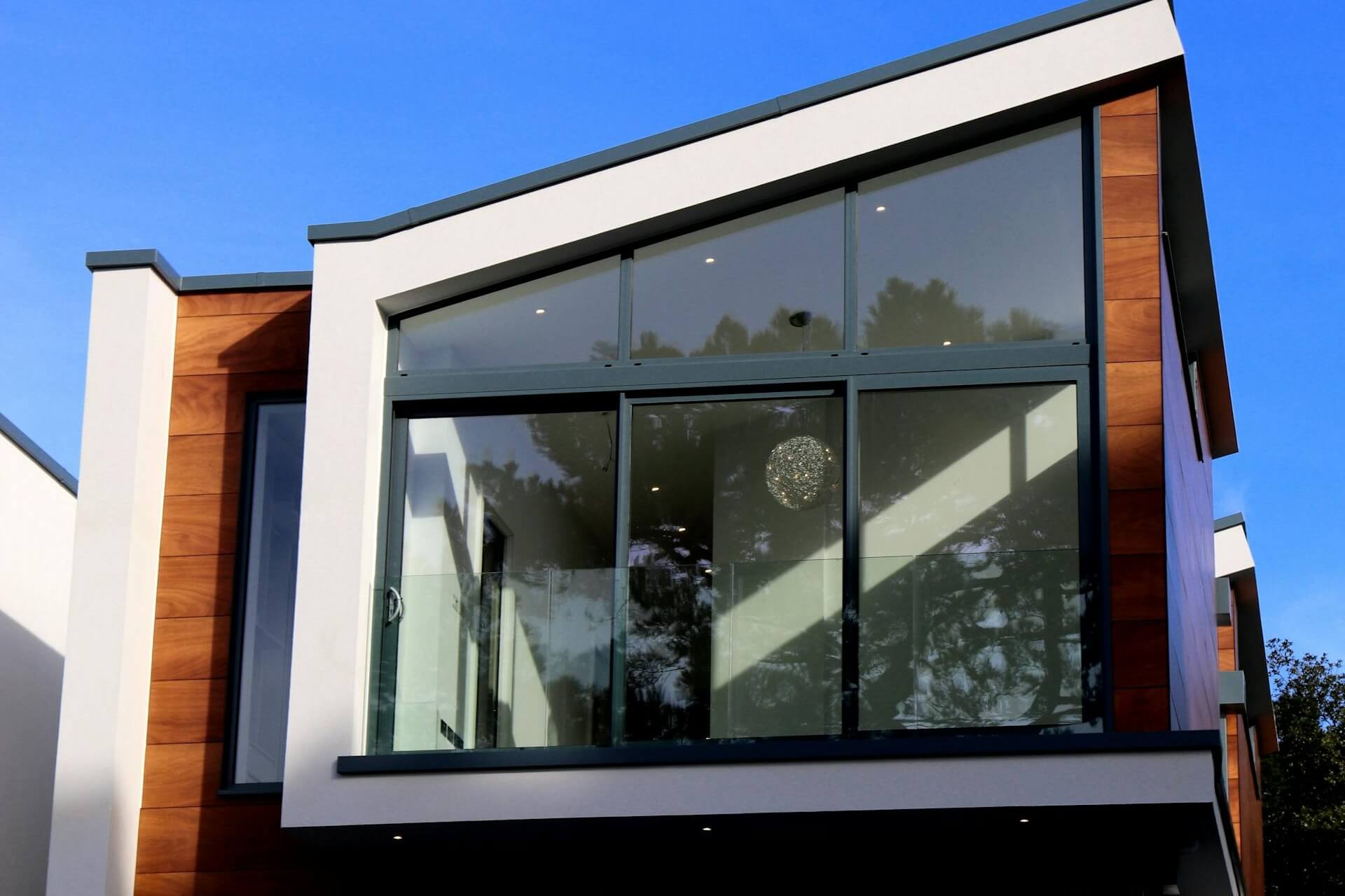 modern home with large glass windows