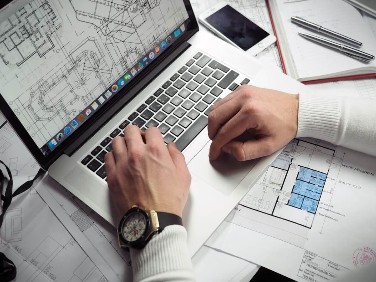 pexels-energepic-com-27411-110469 - Kluk Construction architectural plans on a laptop