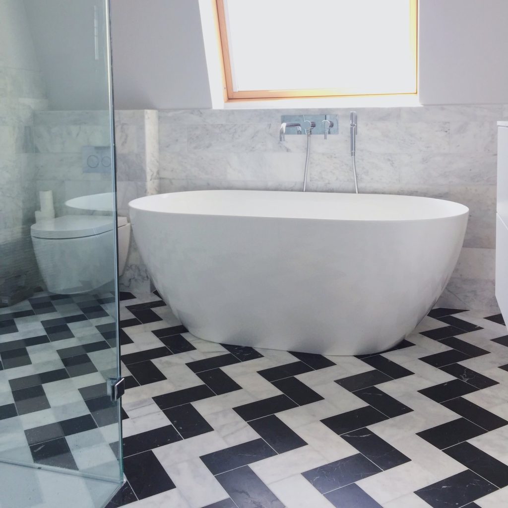 Fulham Marble En-suite Bathroom Renovation - After 1 - Kluk Construction - Kluk Construction Fulham Marble En-suite Bathroom Renovation - Marble Herringbone tiles - After - Kluk Construction - Kluk Construction